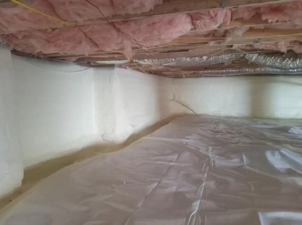 Crawl space encapsulation with closed-cell spray foam for Roof Leak Repair in Valley Stream
